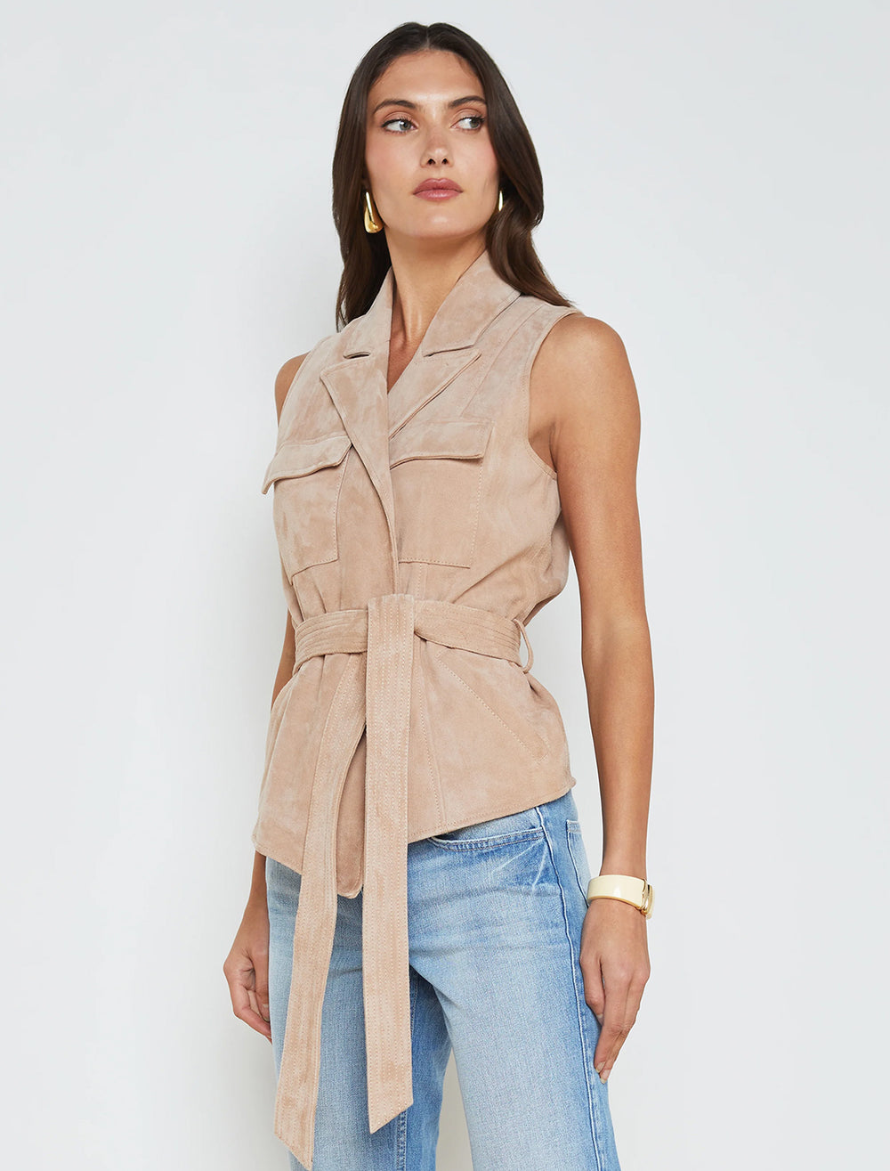 Model wearing L'agence's arbor wrap belted vest in cashew.