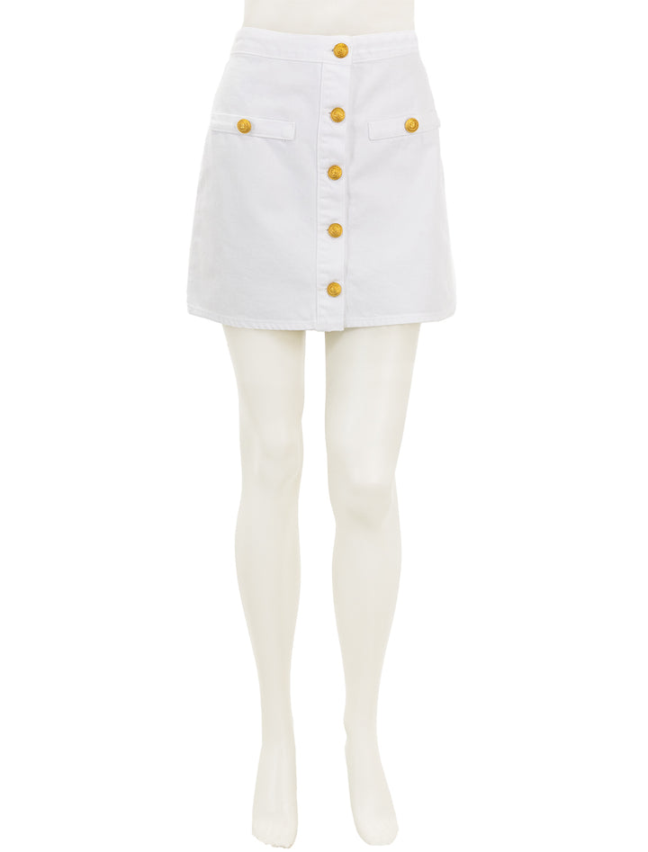 Front view of L'agence's kris button front mini skirt in blanc.