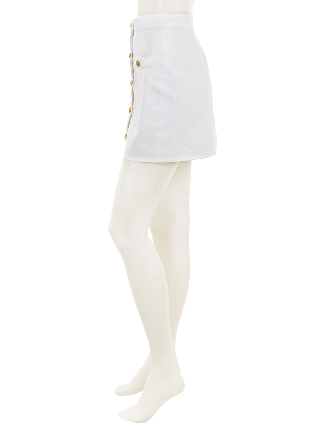 Side view of L'agence's kris button front mini skirt in blanc.