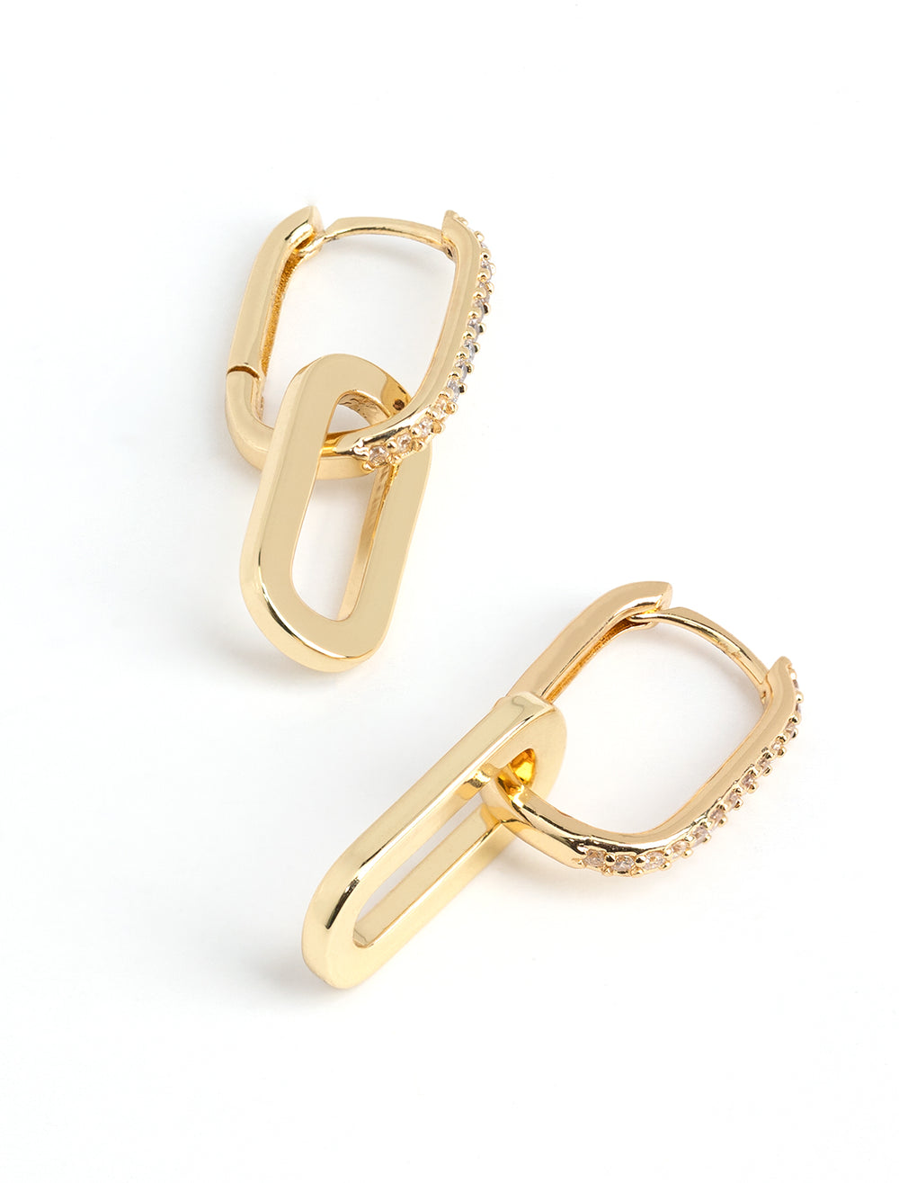 Stylized laydown of AV Max's Crystal Pave Double Link Hoops.
