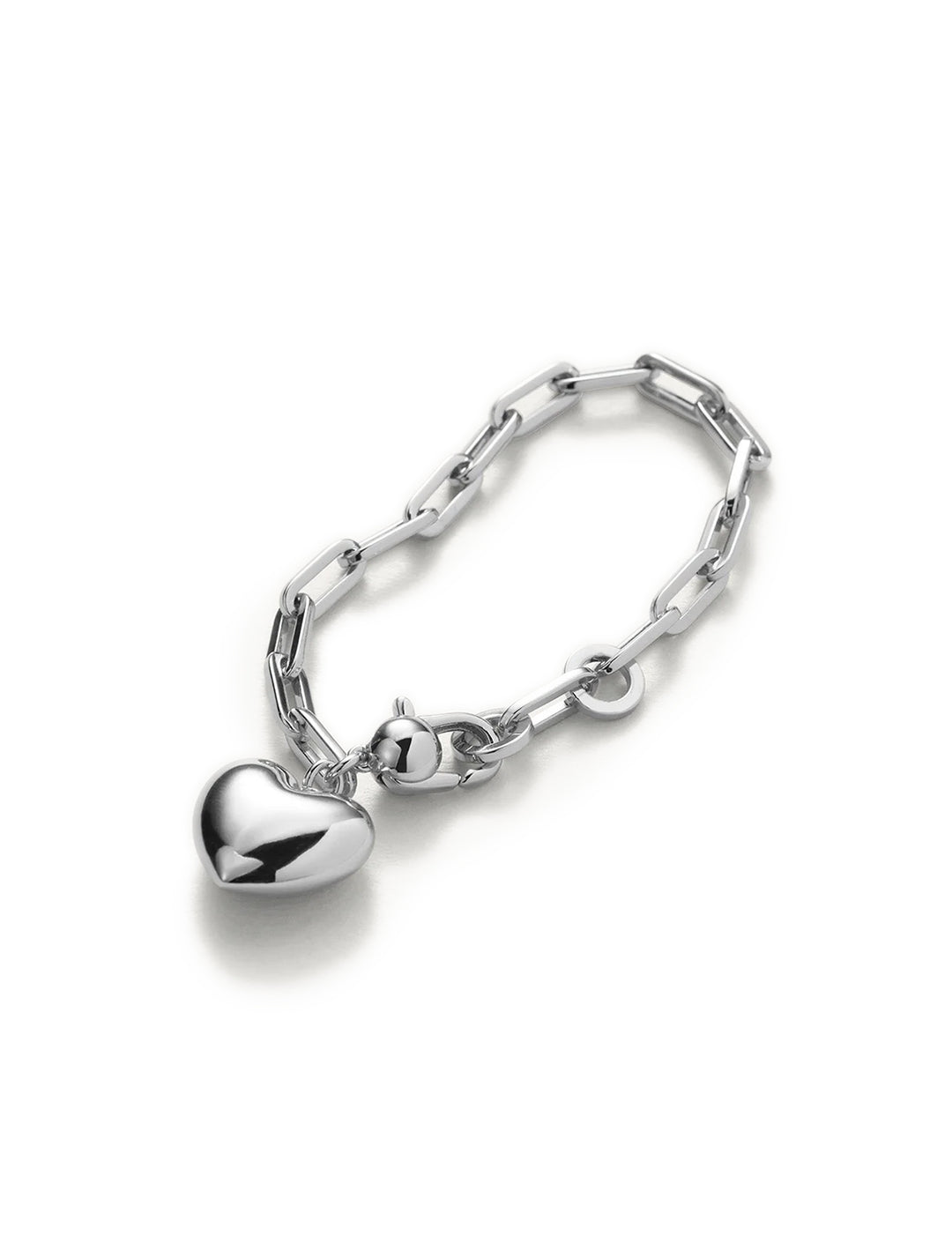 Overhead view of Jenny Bird's puffy heart chain bracelet in silver.