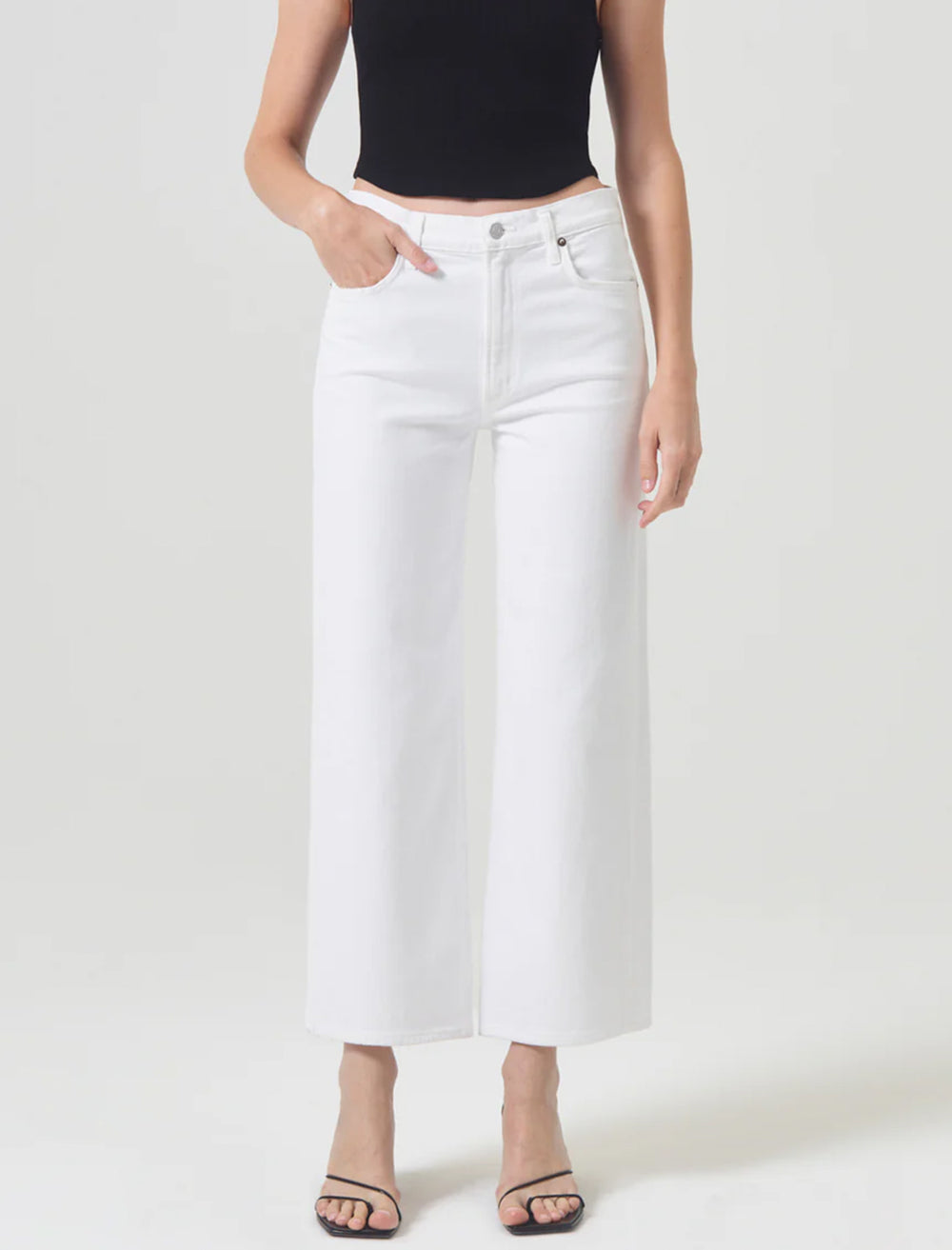Model wearing AGOLDE's harper crop in sour cream.