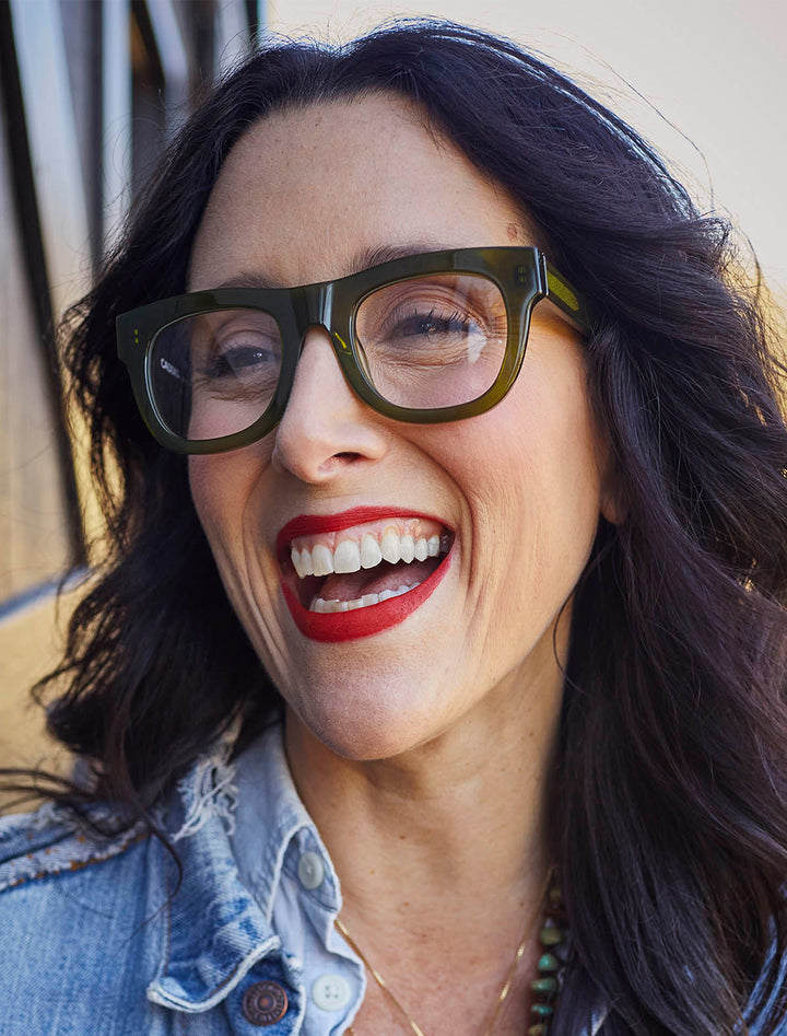 Model wearing Caddis' D28 in heritage green.