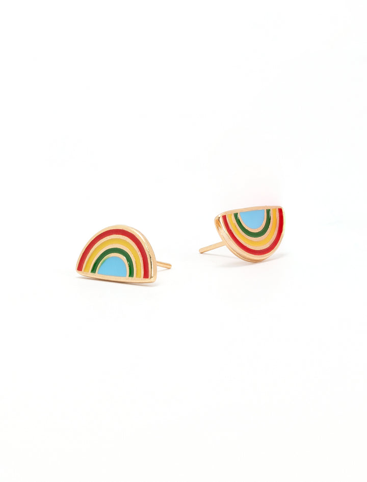 Close-up view of Jonesy Wood's enamel rainbow studs.