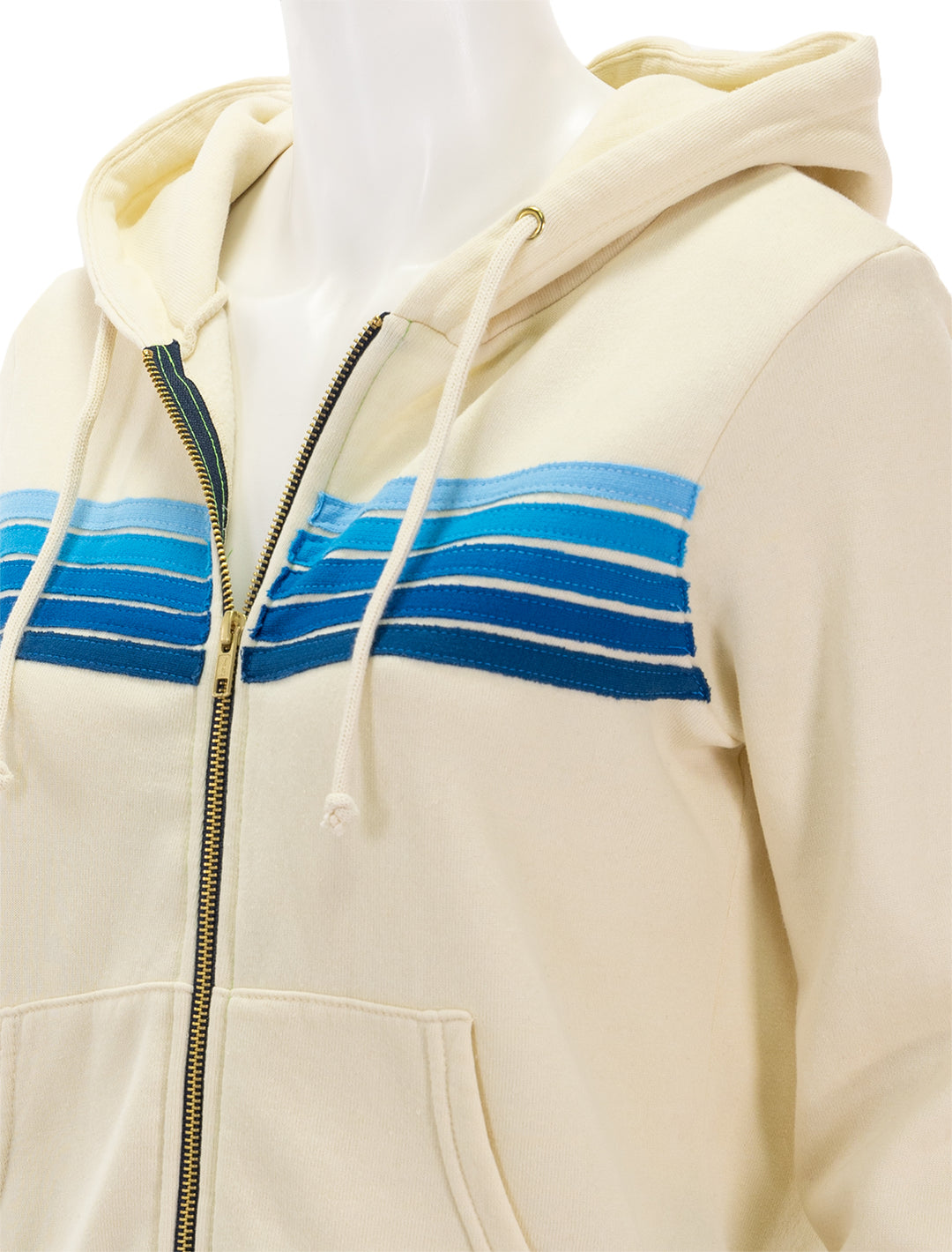 Close-up view of Aviator Nation's 5 stripe zip hoodie in vintage white and blue.