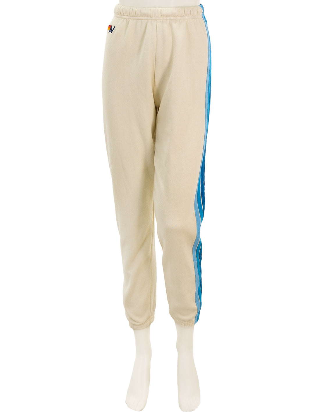 Front view of Aviator Nation's 5 stripe womens sweatpants in vintage white and blue.