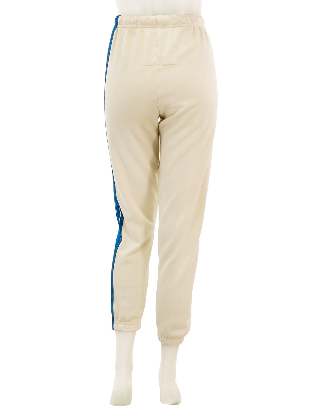 Back view of Aviator Nation's 5 stripe womens sweatpants in vintage white and blue.