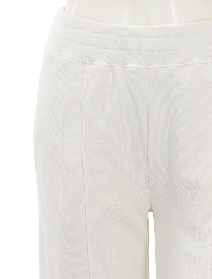 Close-up view of Nation LTD's lincoln front slit knit pant in porcelain.