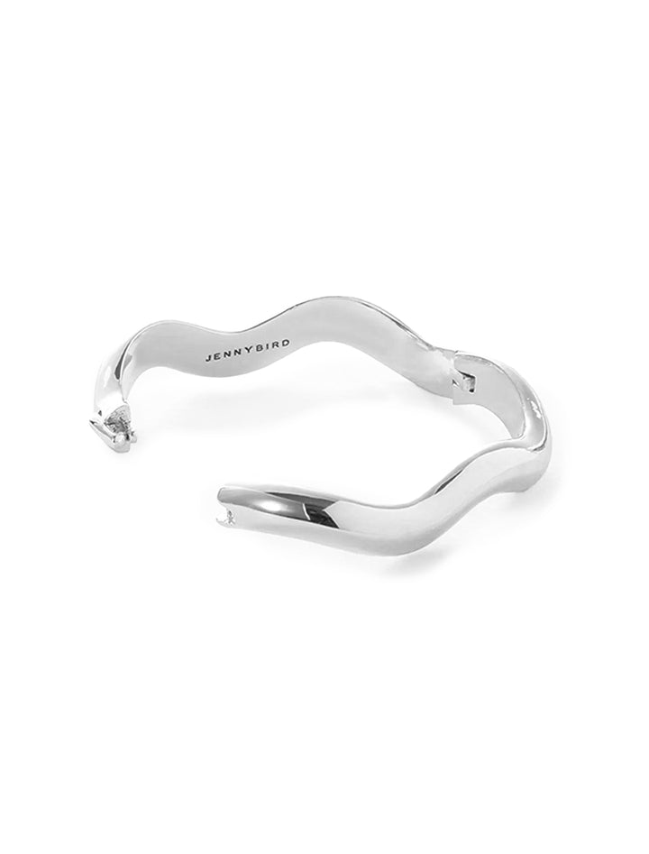 View of Jenny Bird's ola bangle in silver unclasped.