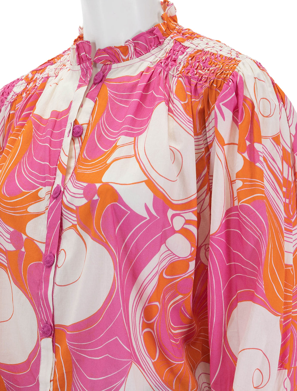 Close-up view of Rhode's louisa top in pink deco.