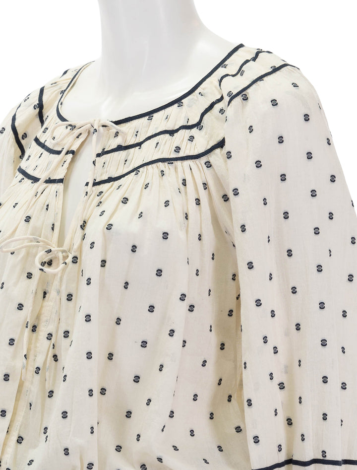 Close-up view of Ulla Johnson's francoise blouse in ivory.