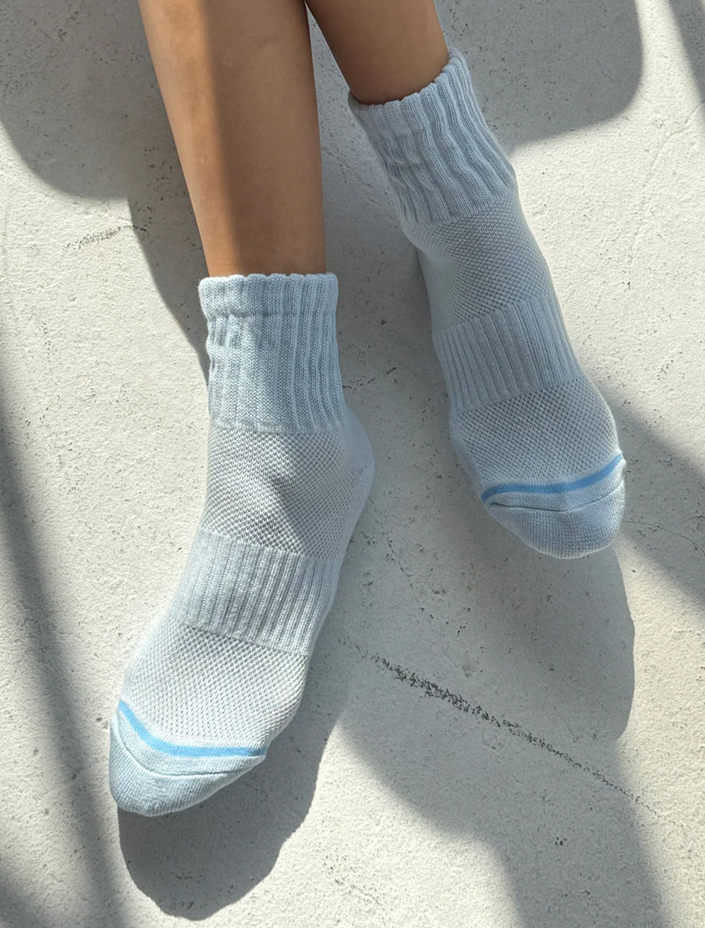 Model wearing Le Bon Shoppe's swing socks in blue.