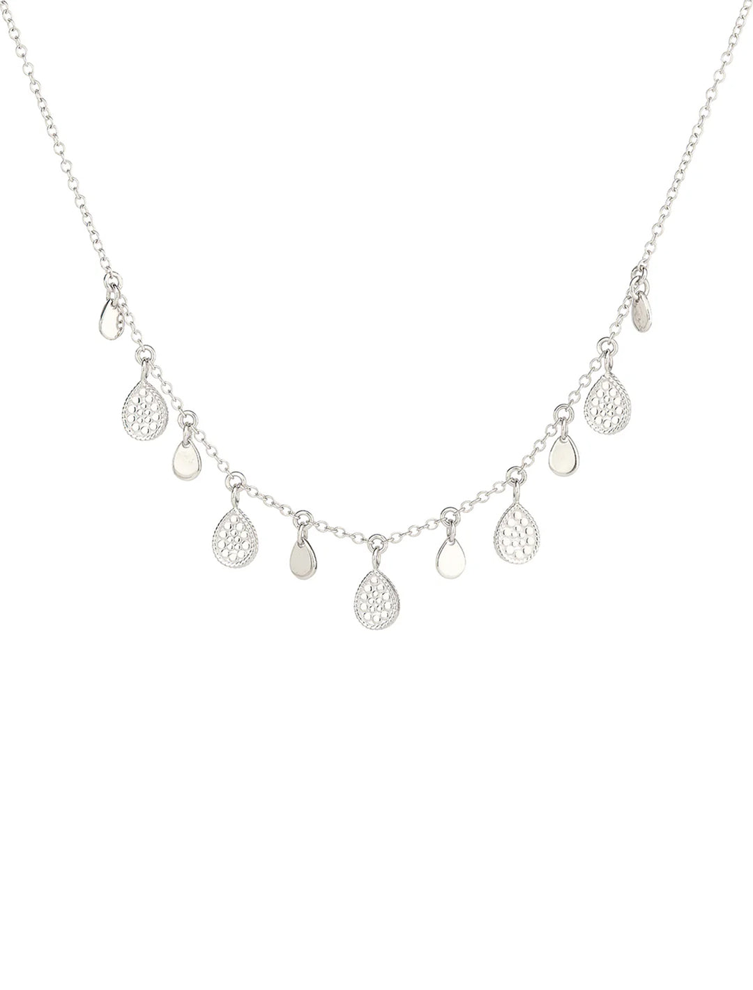 Front view of Anna Beck's teardrop charm necklace in silver.