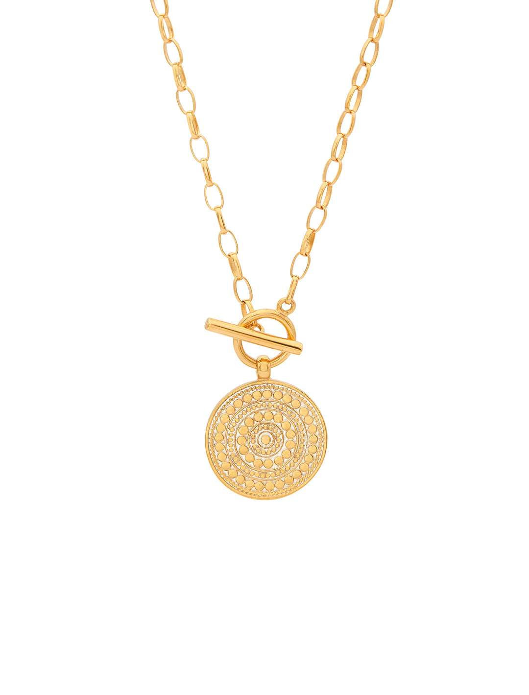 Front view of Anna Beck's classic dotted circle toggle necklace in gold.