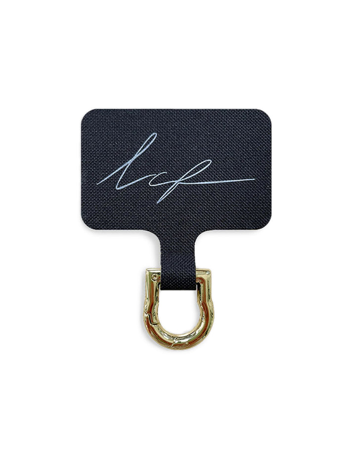 Overhead view of La Coque Francaise universal adapter in gold.