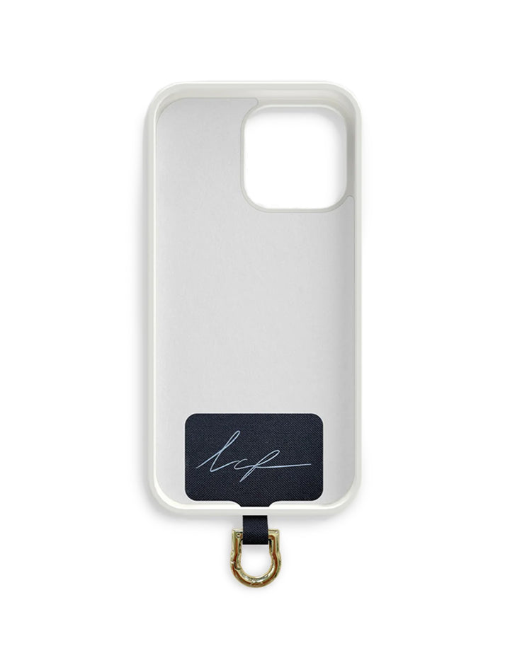 La Coque Francaise universal adapter in gold shown inside a phone case