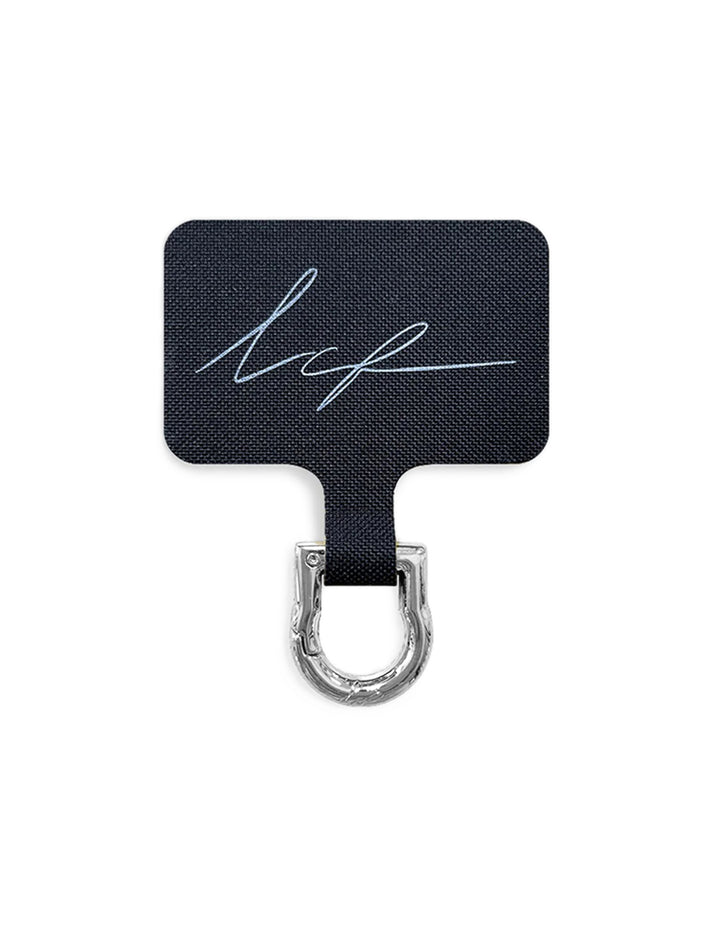 Overhead view of La Coque Francaise universal adapter in silver.