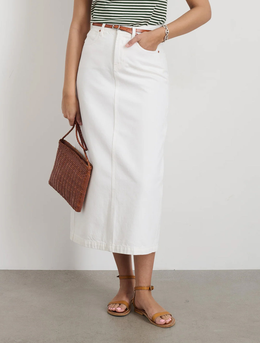 model wearing ruby denim skirt in sea salt