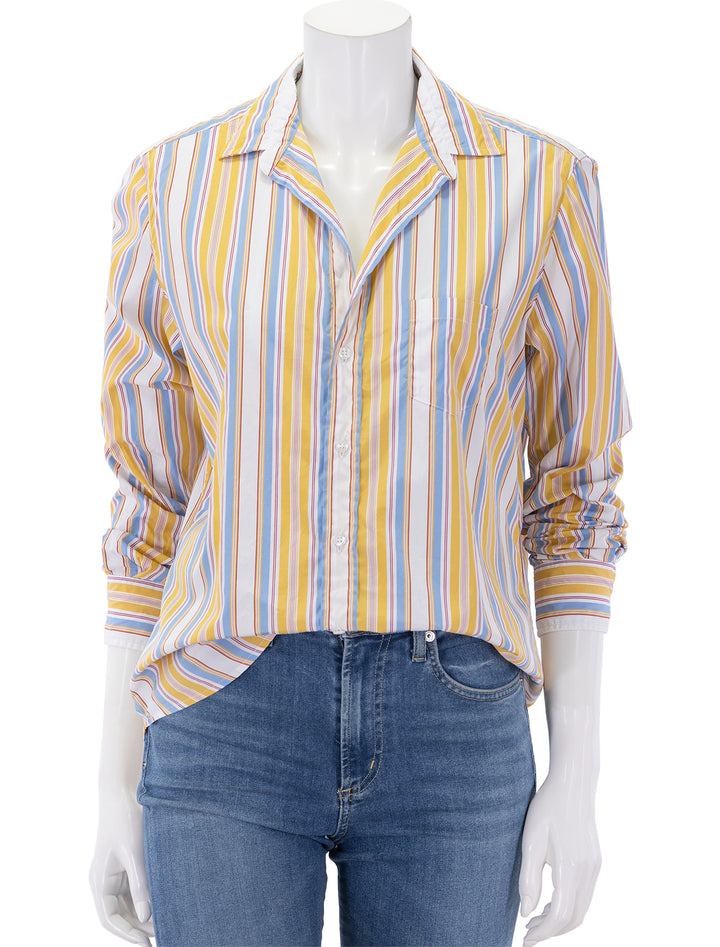 eileen in gold, red and blue stripe