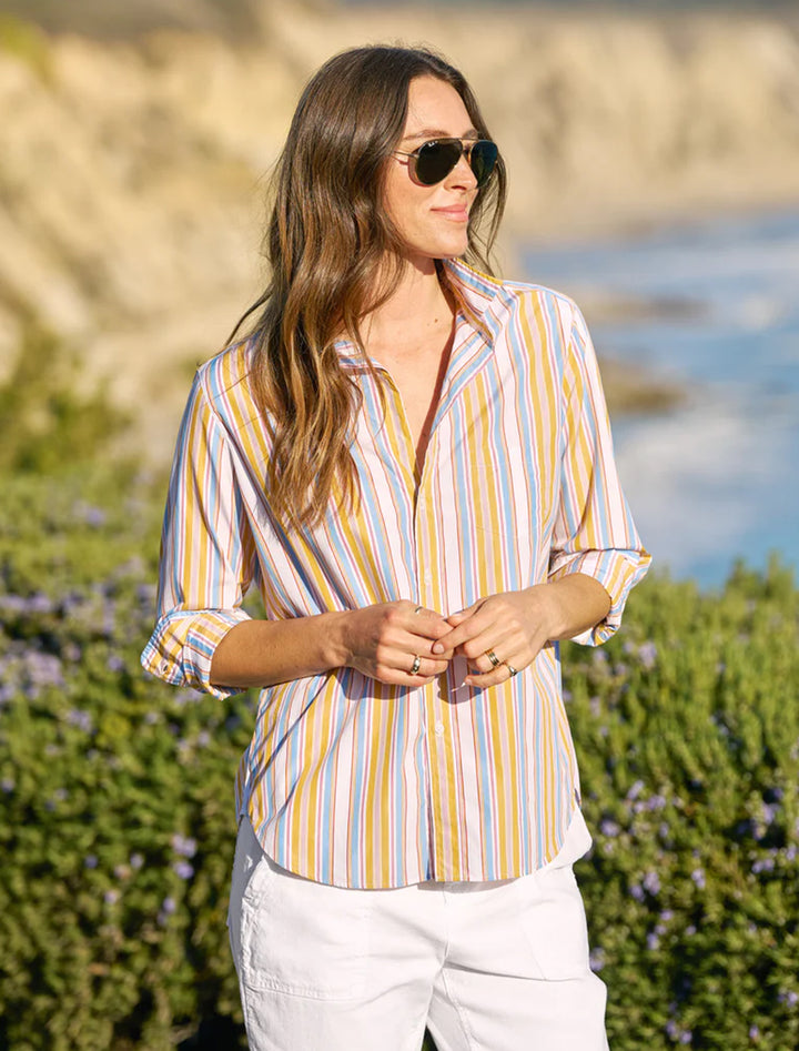 eileen in gold, red and blue stripe