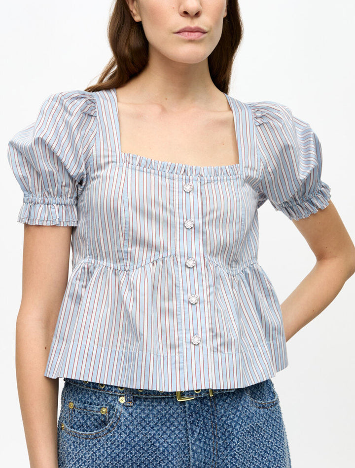 model wearing striped soft chambray blouse