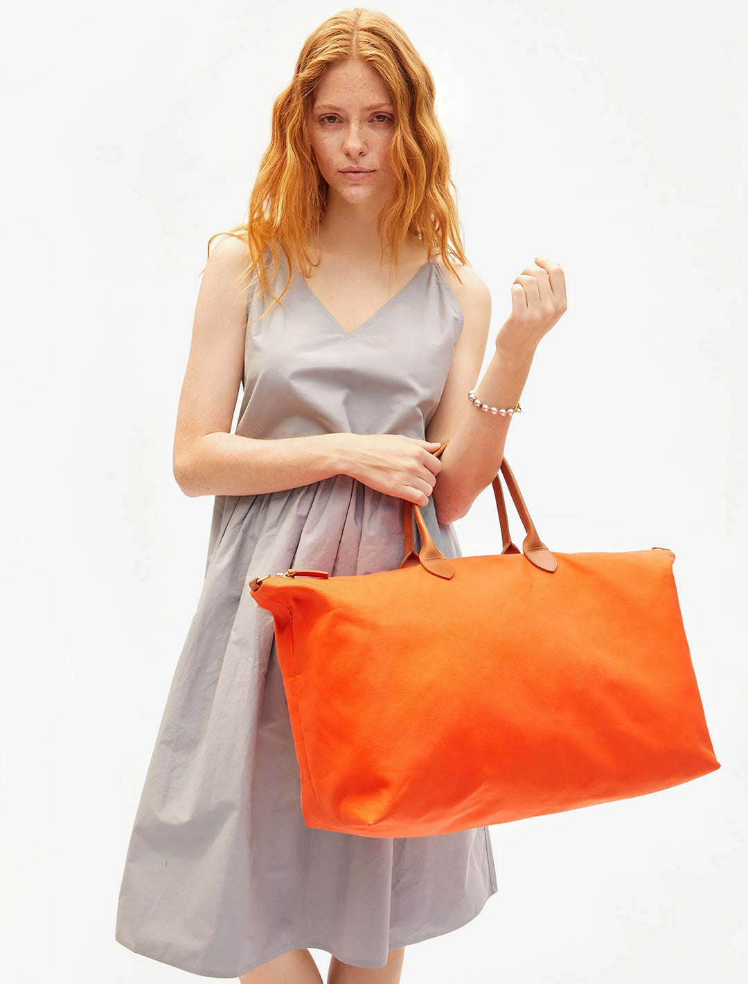 weekender in tangerine canvas