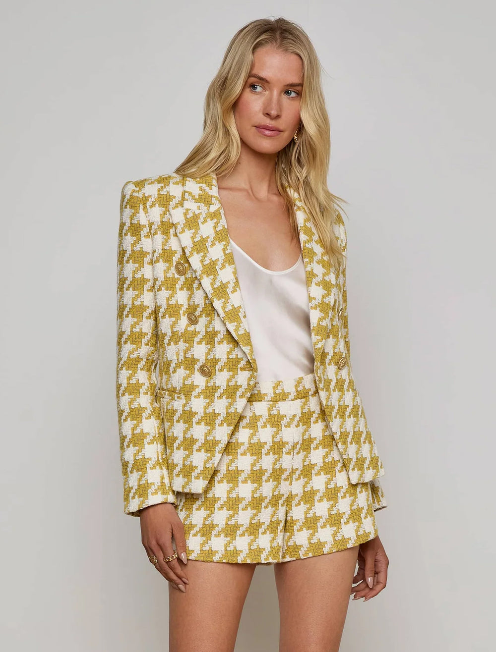 model wearing marie double breasted blazer in ceyon yellow hounsdtooth