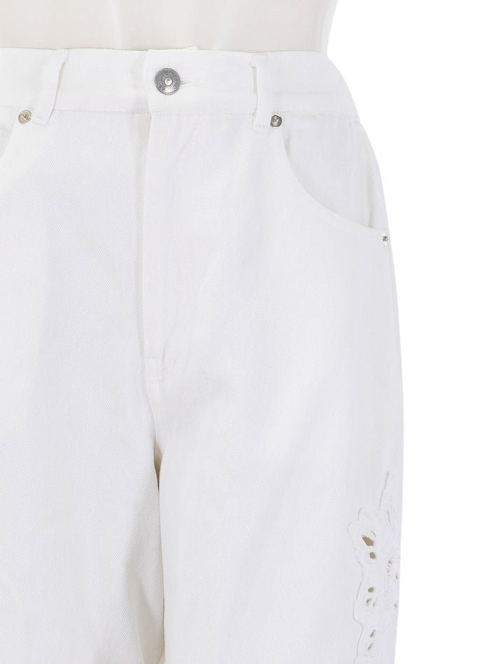 close up view of cavina jeans in white