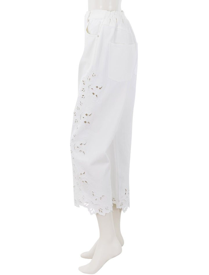 side view of cavina jeans in white