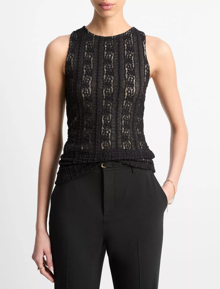 model wearing high neck shell in black textured lace
