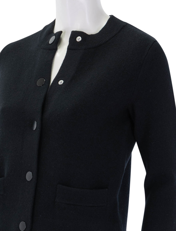 close up view of shrunken snap soft sculp cardigan in black
