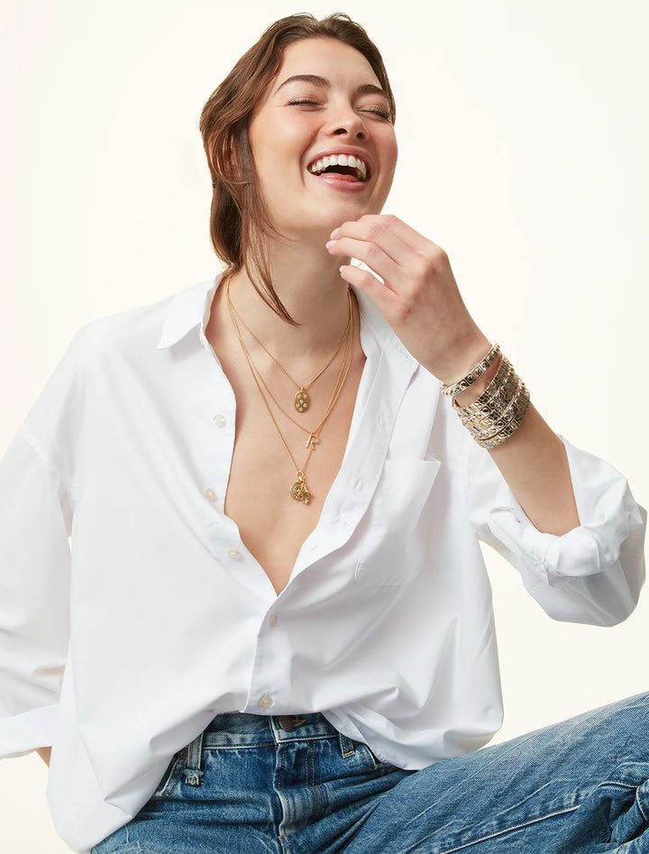 model wearing the stud bracelet in silver and gold