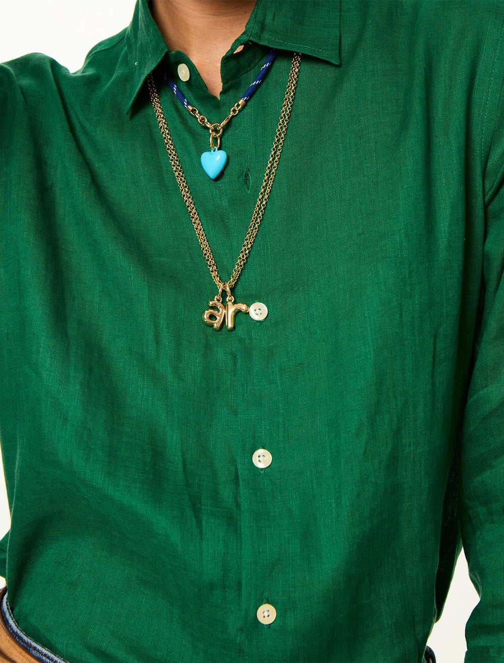 model wearing the puffy initial necklace | r