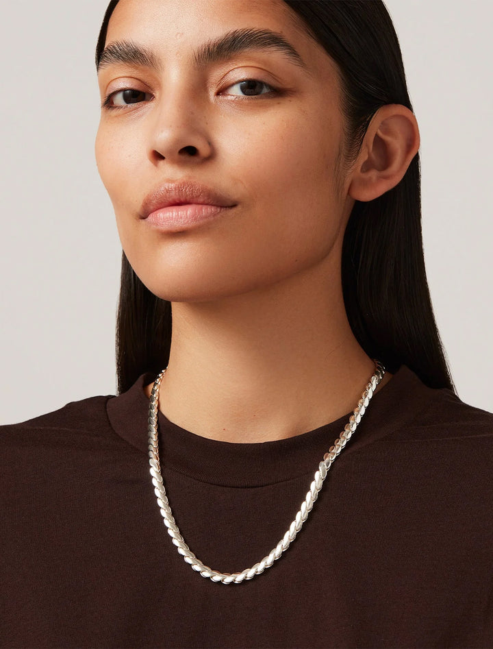 model wearing paloma chain in silver