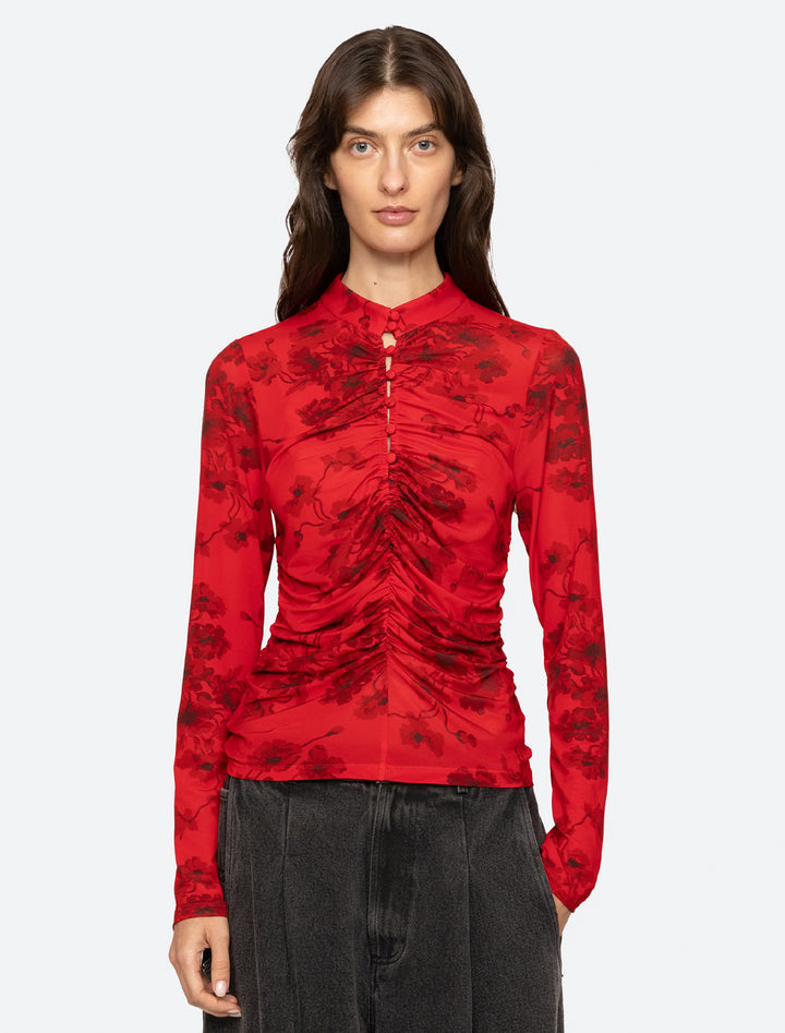 cornelia print long sleeve top in red