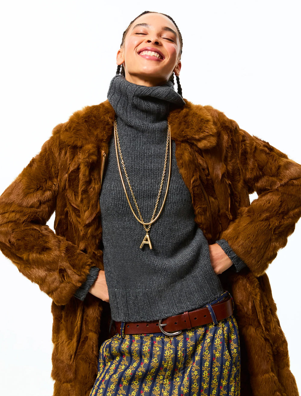 model wearing the big puffy initial necklace | A