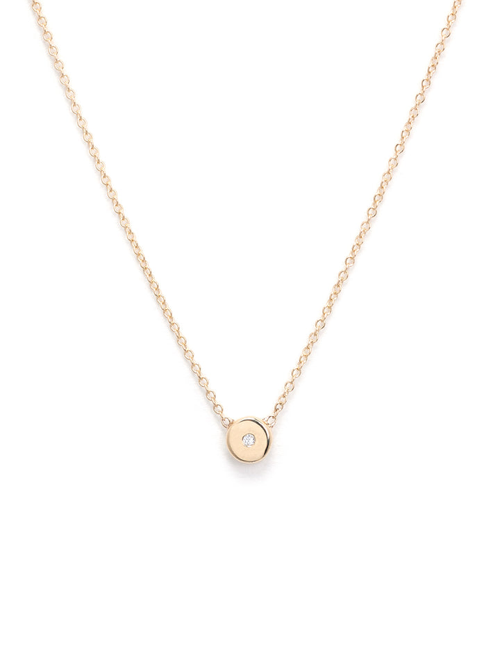 Front view of Zoe Chicco's diamond and gold small nugget necklace.