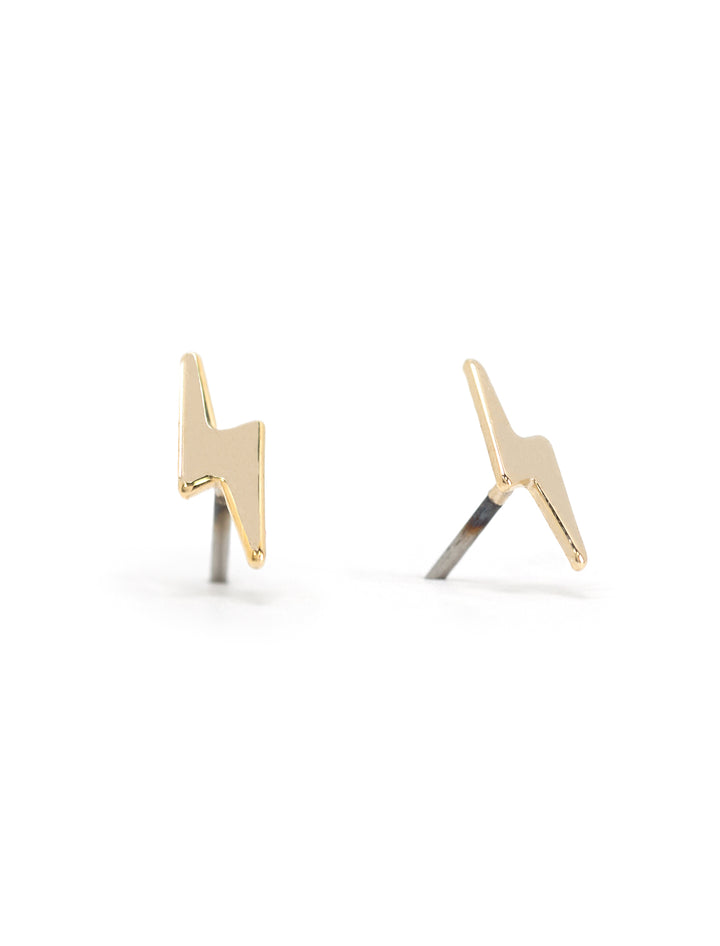 Front view of AV Max's gold lightening bolt earrings.