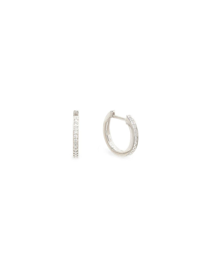 Sydney Evan's pave huggie hoops in white gold.