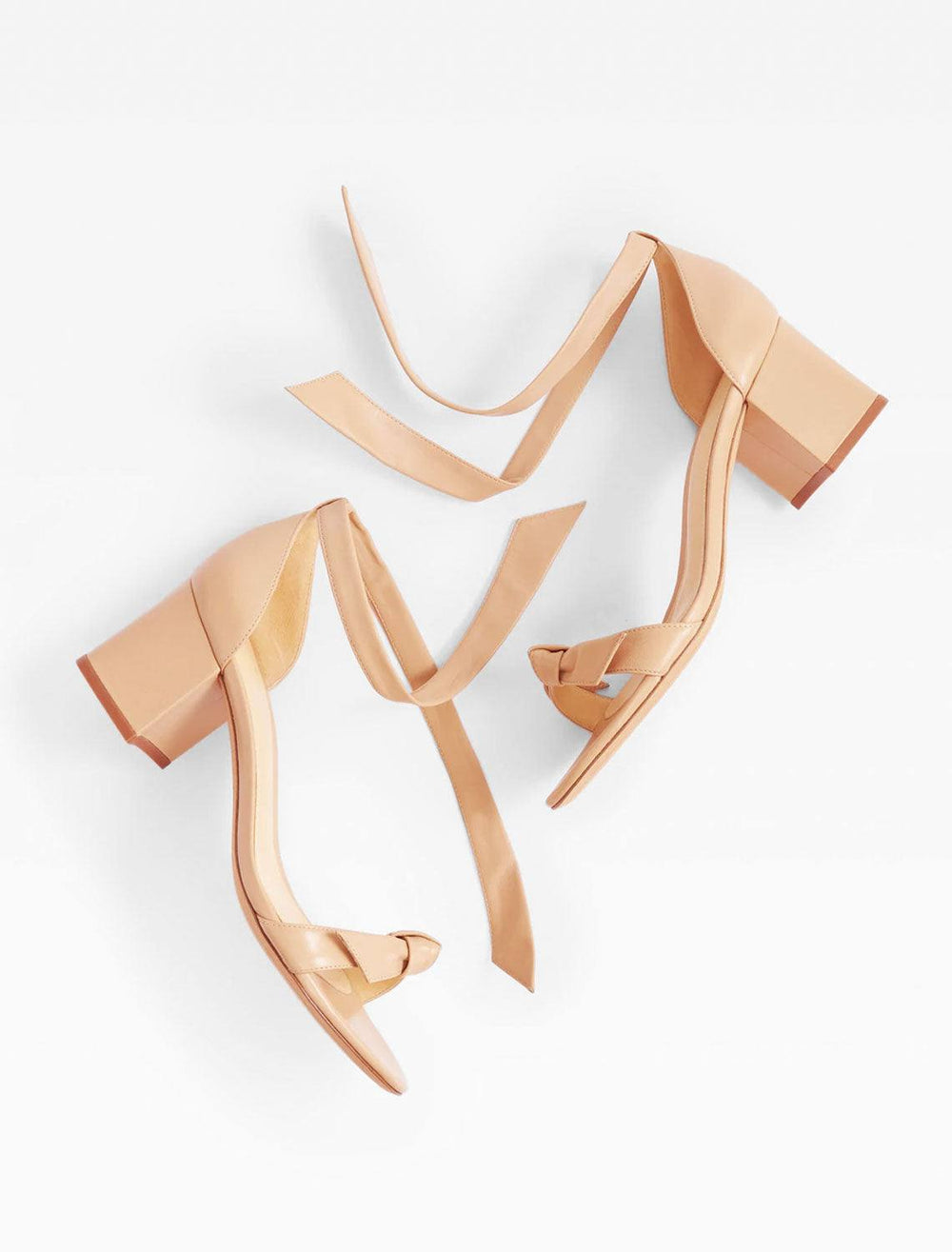 styled image of clarita block 60 in nude laying flat on table