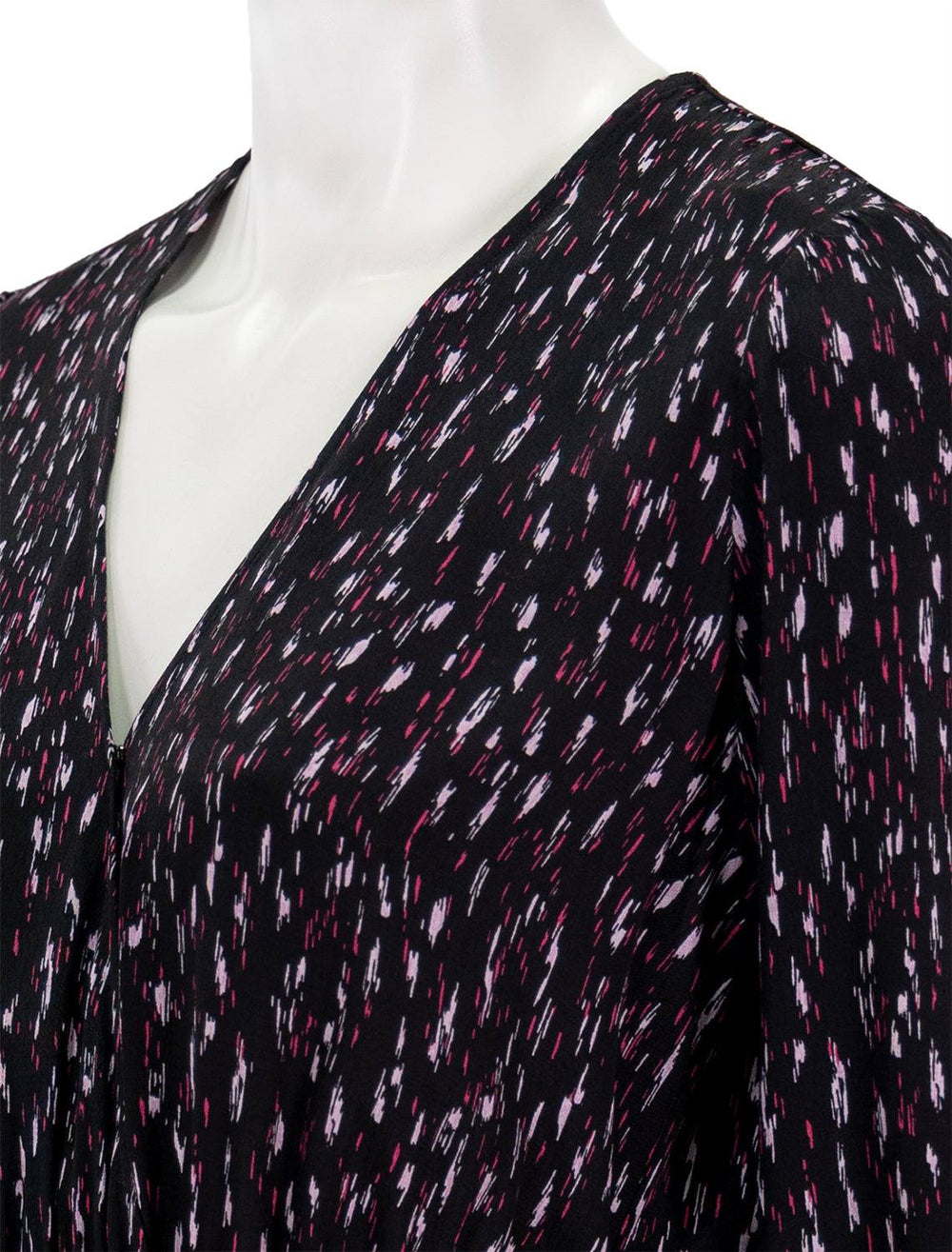Close-up view of Scotch & Soda's Wrapped Short Dress in Ikat Raisin Print.