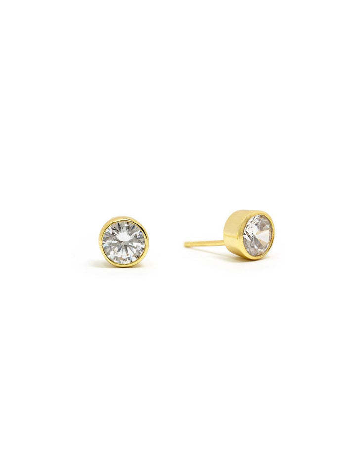 solitaire bezel set studs in gold