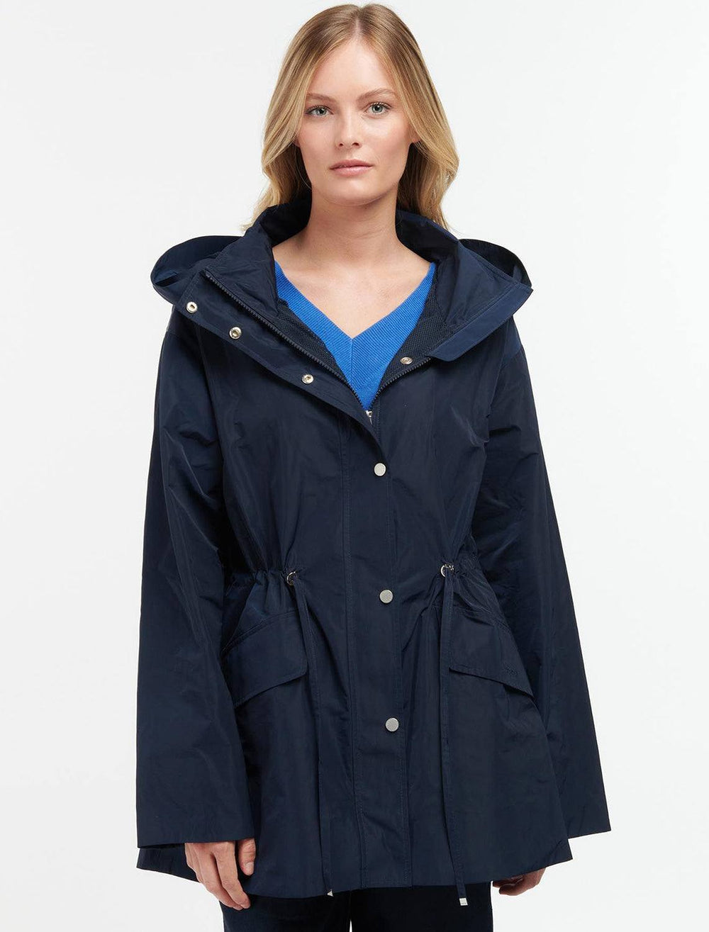 Model wearing Barbour's wishaw showerproof jacket in deep indigo.