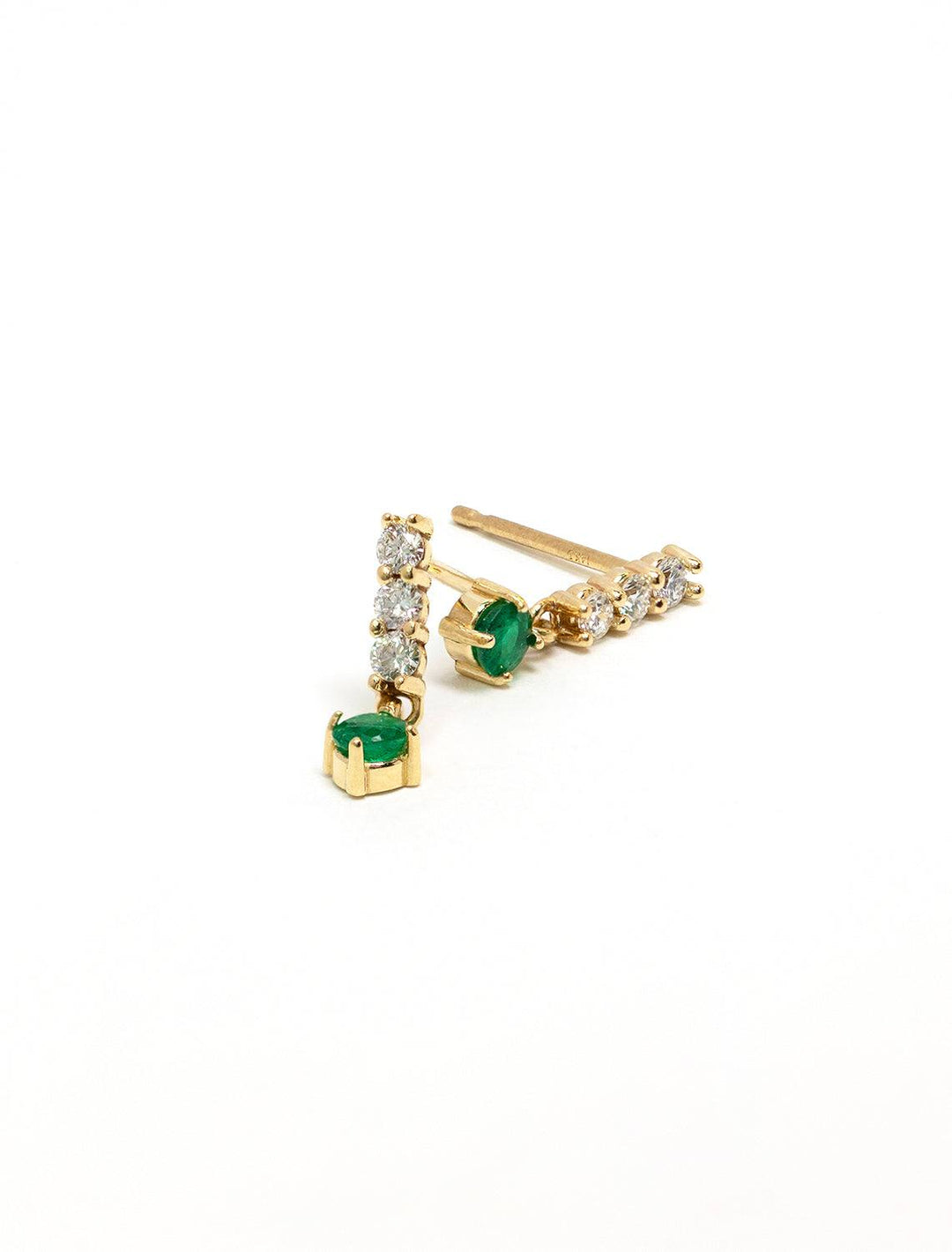 Stylized laydown of Zoe Chicco's 14k diamond bar earrings with emerald drops.