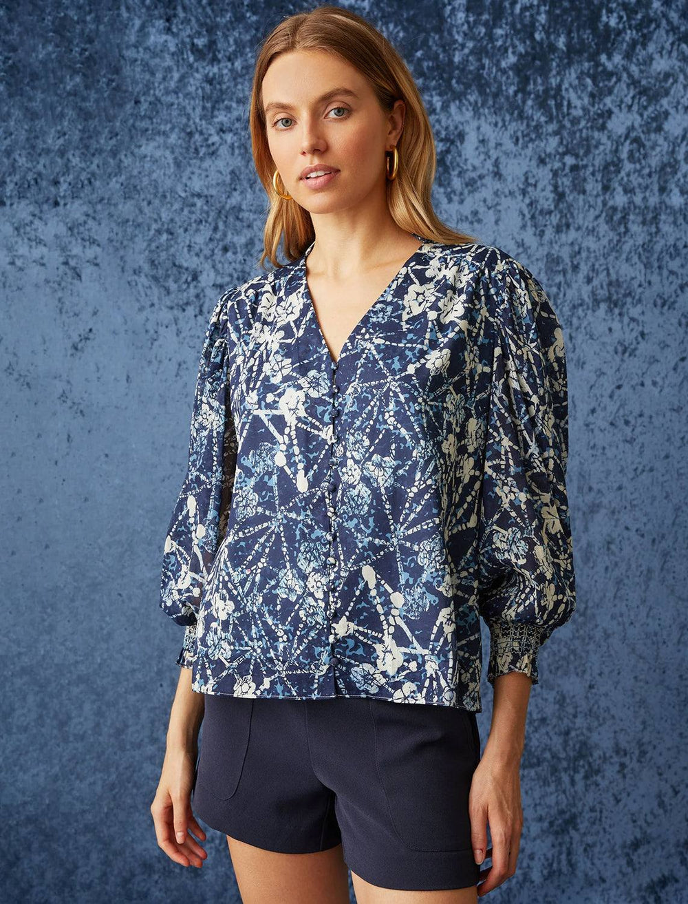 Model wearing Marie Oliver's imogen blouse in Batik Floral.
