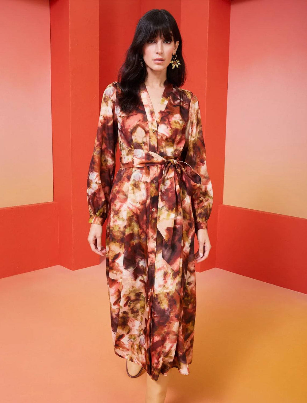 model wearing lillian shirt dress in vineyard with tan knee-high boots