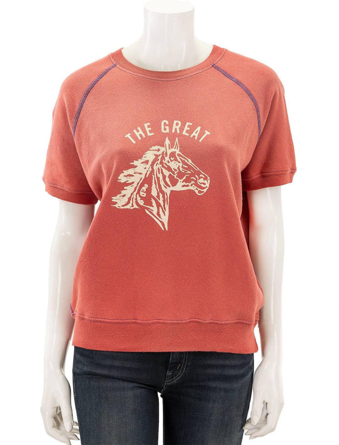 Front view of The Great's short sleeve bronco sweatshirt in double washed red.