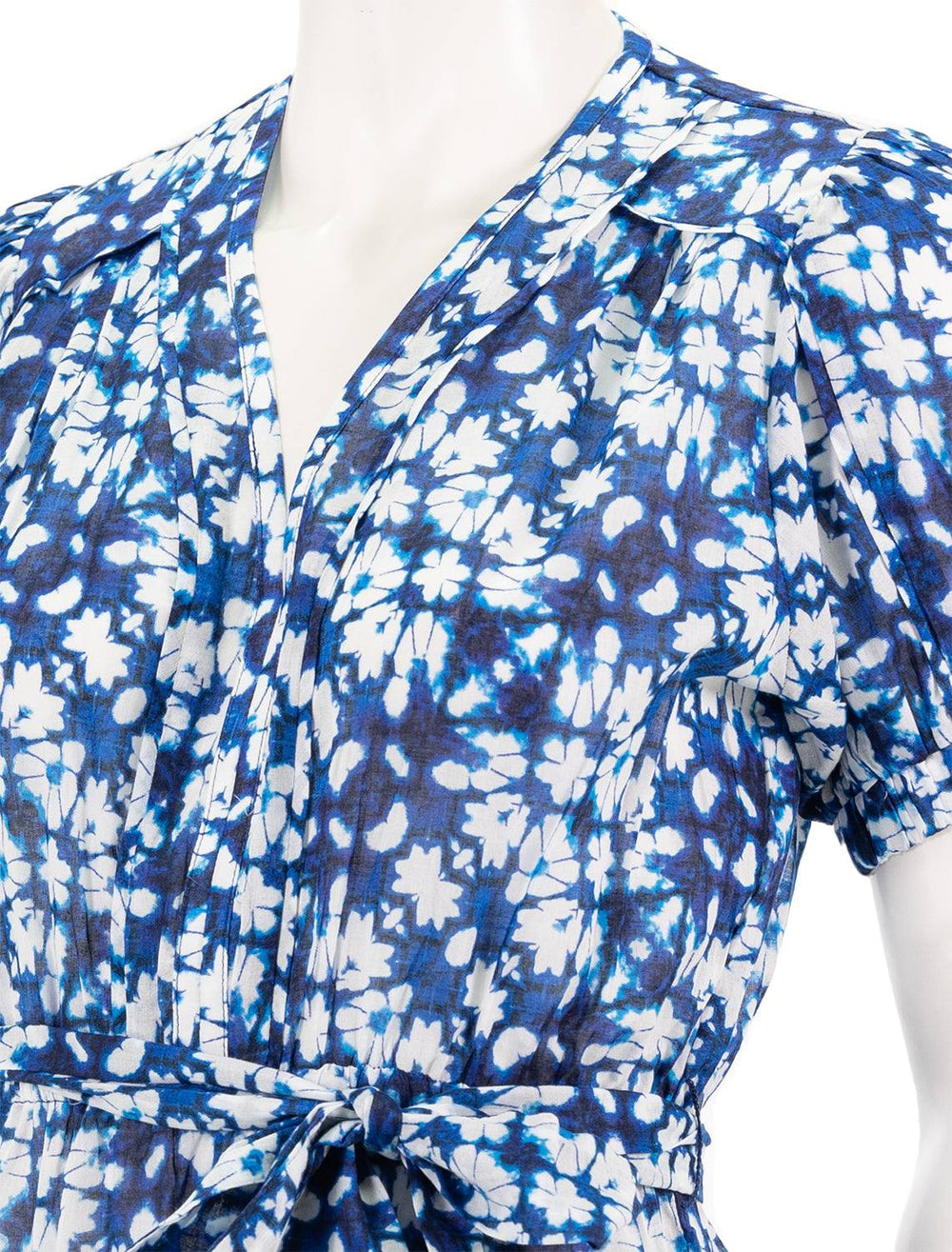Close-up view of Suncoo Paris' corail dress in blue batik.