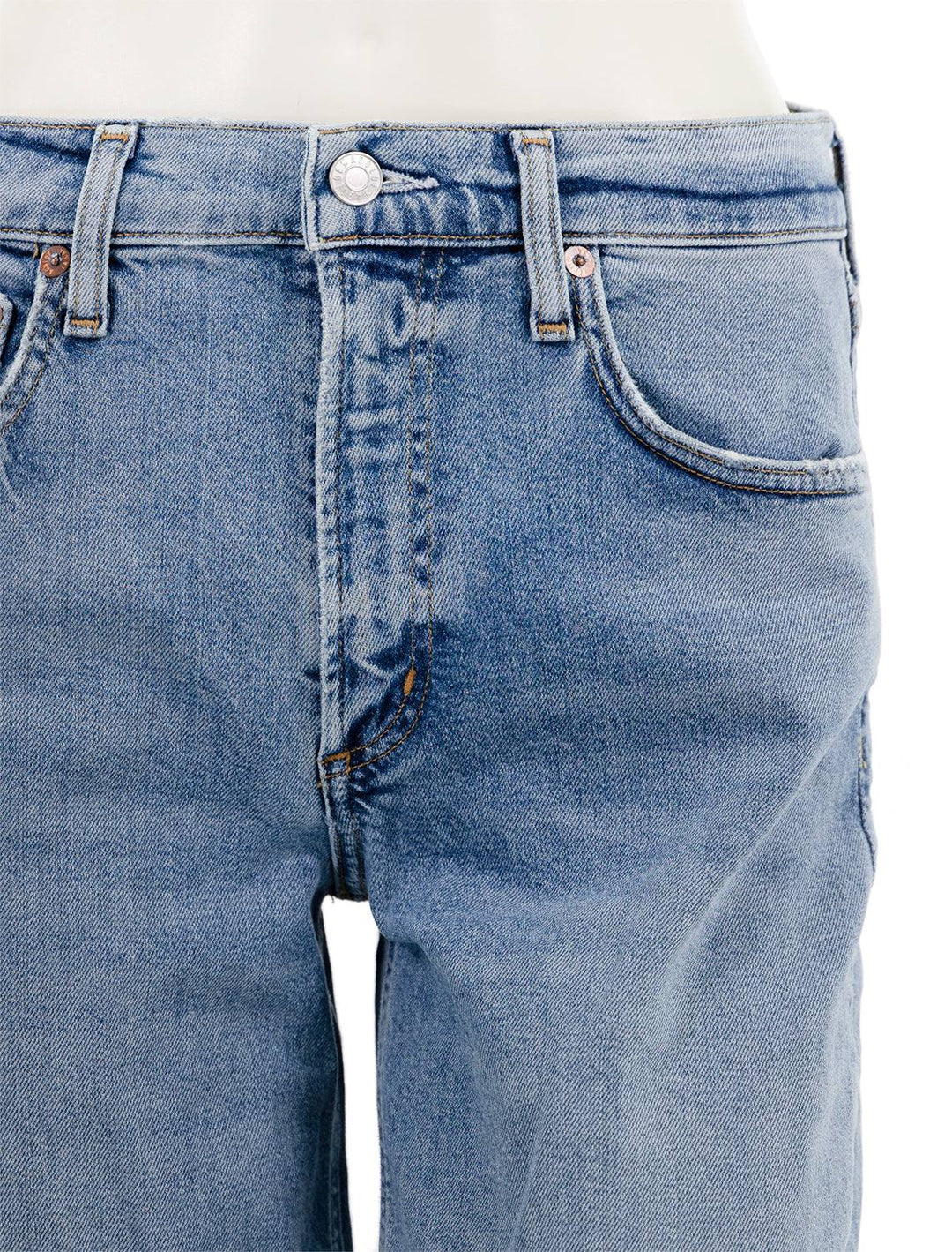 Close-up view of AGOLDE's kye straight jeans in foreseen.