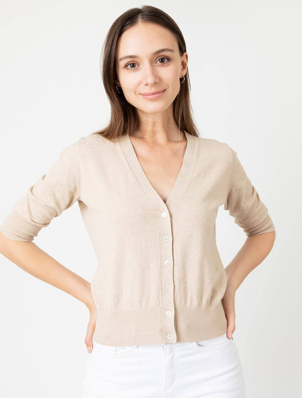 Model wearing Ann Mashburn's rosie v-neck sweater in sable.